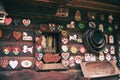 Facade of a small log house with colorful decorations. Royalty Free Stock Photo
