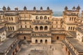 Facade with small towers of the fort in Orchha