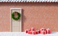 Facade with snow, door and gifts on the ground