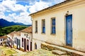 Facade of some old houses and street in colonial architecture Royalty Free Stock Photo