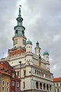 The facade with stone arcades and tower of the historic Renaissance town hall