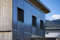 Facade Of A Sustainable Wooden Prefabricated House With Solar Thermal Collectors For Heating