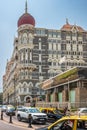 Facade of The Taj Mahal Palace hotel in Colaba district. Taj Mahal hotel famous building of touristic part in Mumbai Royalty Free Stock Photo