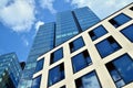 Facade texture of a glass mirrored office building. Fragment of the facade. Royalty Free Stock Photo