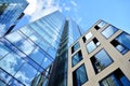 Facade texture of a glass mirrored office building. Fragment of the facade. Royalty Free Stock Photo