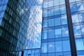 Facade texture of a glass mirrored office building. Fragment of the facade.