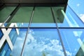 Facade texture of a glass mirrored office building. Fragment of the facade.