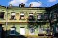 Facade of the three-storey green brick building Royalty Free Stock Photo