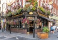 Facade of a traditional english pub in Covent Garden in the heart of London`s West End on a sunny day