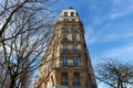 The facade of traditional French house with typical balconies and windows. Paris. Royalty Free Stock Photo