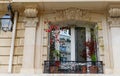 The facade of traditional French house with typical balconies and windows. Paris. Royalty Free Stock Photo