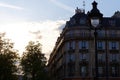 The facade of traditional French house with typical balconies and windows. Paris. Royalty Free Stock Photo