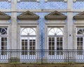 Traditional facade of a Portuguese house decorated with ornate azulejo tiles in the streets of Porto, Portugal Royalty Free Stock Photo