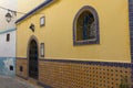 Facade of a traditional house decorated with tiles