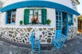 Facade of a traditional tavern, in the Greek Mediterranean architecture, old Skiathos town, Greece Royalty Free Stock Photo