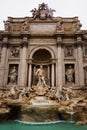 Facade of the Trevi Fountain with the statue of Neptune in Rome