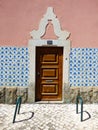 Facade of a typical Portuguese house decorated with vintage Portuguese tiles azulejos Royalty Free Stock Photo