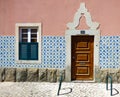 Facade of a typical Portuguese house decorated with vintage Portuguese tiles azulejos Royalty Free Stock Photo