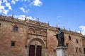 Facade of the University of Salamanca and the statue of Fray Luis de Leon