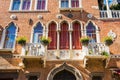 Facade with Venetian windows and balcony in Venice Royalty Free Stock Photo