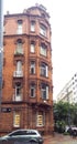 Facade view of a neoclassical brick building, in Republica Arabe and Cabello streets. Buenos Aires, Argentina