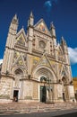 Facade view of the opulent and monumental Orvieto Cathedral in Orvieto.