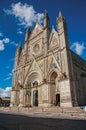 Facade view of the opulent and monumental Orvieto Cathedral in Orvieto.