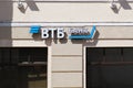 Facade of VTB Bank branch with illuminated signboard