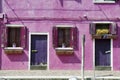 Facade with window and door of a house in Burano in Venetian lagoon, Venice, Italy Royalty Free Stock Photo