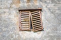 Facade with window of an old abandoned house with weathered wood Royalty Free Stock Photo