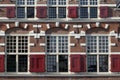 Facade with window shutters in Leiden, Netherlands