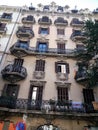 Facade with windows and balconies, historic building. Royalty Free Stock Photo