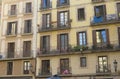 Facade with windows and balconies, historic building. Royalty Free Stock Photo