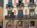 Facade with windows and balconies, historic building. Barcelona city. Royalty Free Stock Photo