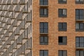 Facade with windows of an unfinished building, closeup house Royalty Free Stock Photo
