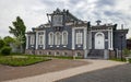 Facade of the wooden house of the Decembrist Sergei Trubetskoy 1854-56 in Irkutsk in summer in cloudy weather