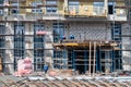 Facade work in the construction of an apartment building