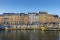 Facades of apartment buildings at Ile de la cite with nice blue sky in Paris Royalty Free Stock Photo