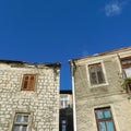 Facades of coastal multi-story houses with a bright blue sky in the background Royalty Free Stock Photo