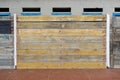 Facades covered with wooden planks to protect against winter weather and sea storms