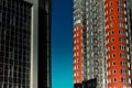 Facades of high-rise modern buildings. Facade of residential and office space Royalty Free Stock Photo