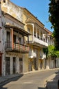 Facade with colonial-style wooden balconies on a street in Cartegena, Colombia. Royalty Free Stock Photo