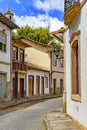 Facades of old houses built in colonial architecture with their balconies, roofs and colorful details Royalty Free Stock Photo