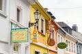 Facades with shop signs in the old town of Moers, Germany