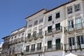 Facades of typical buildings at PraÃ§a do Giraldo, Ãvora, Alentejo, Portugal Royalty Free Stock Photo