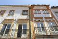Facades of typical buildings at PraÃ§a do Giraldo, Ãvora, Alentejo, Portugal Royalty Free Stock Photo