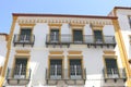 Facades of typical buildings at PraÃ§a do Giraldo, Ãvora, Alentejo, Portugal Royalty Free Stock Photo