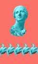 Face of ancient statue and sea green turtle on a coral color background. Art, adventure, underwater archeology concept. Royalty Free Stock Photo