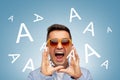 Face of angry shouting a letters man in sunglasses Royalty Free Stock Photo