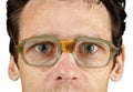 Face in bad old spectacles Royalty Free Stock Photo